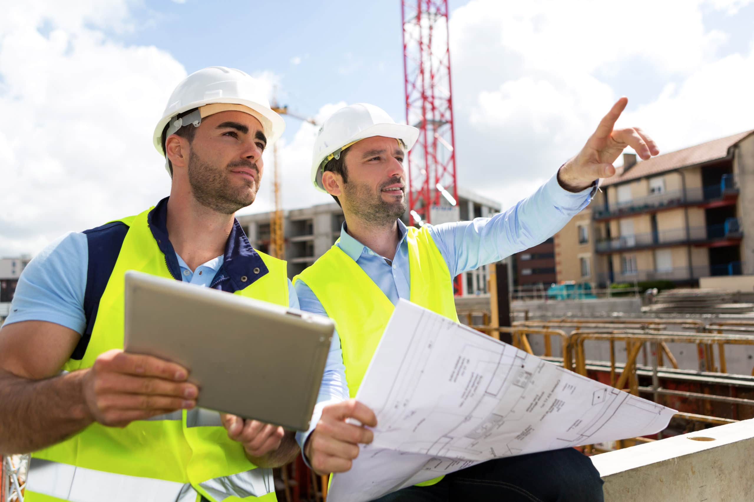 View of a Worker and architect watching some details on a construction