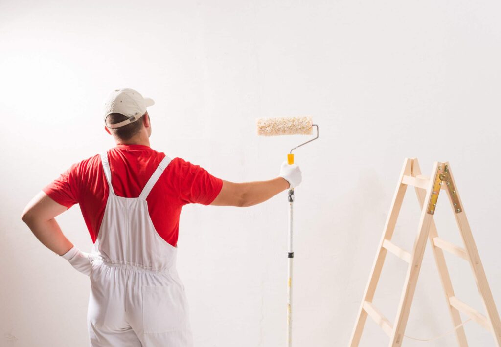 painter painting a wall