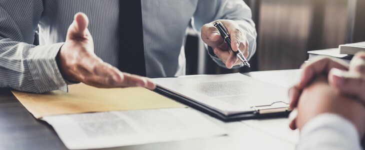 Commission pay employee consulting with a lawyer about his overtime pay