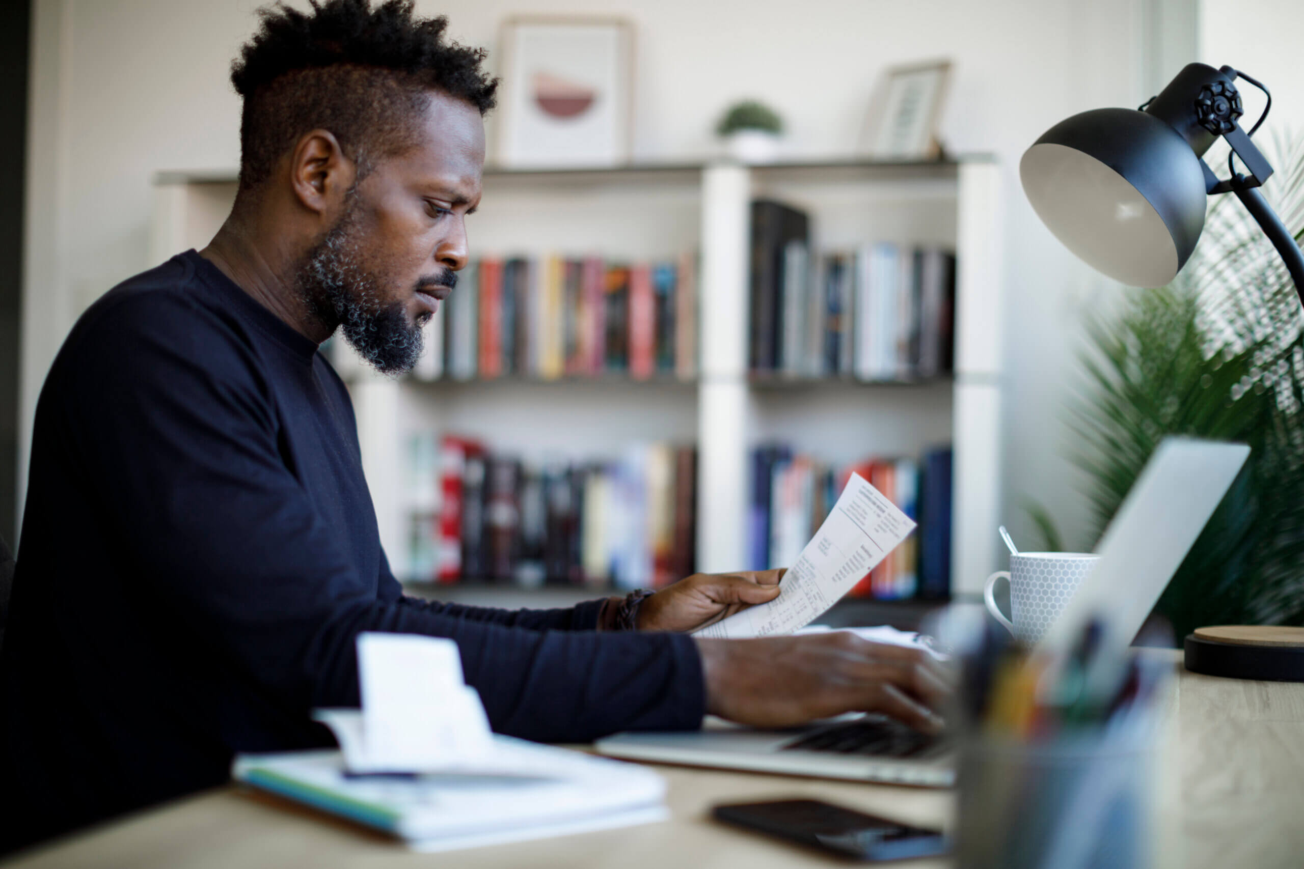 man with paycheck