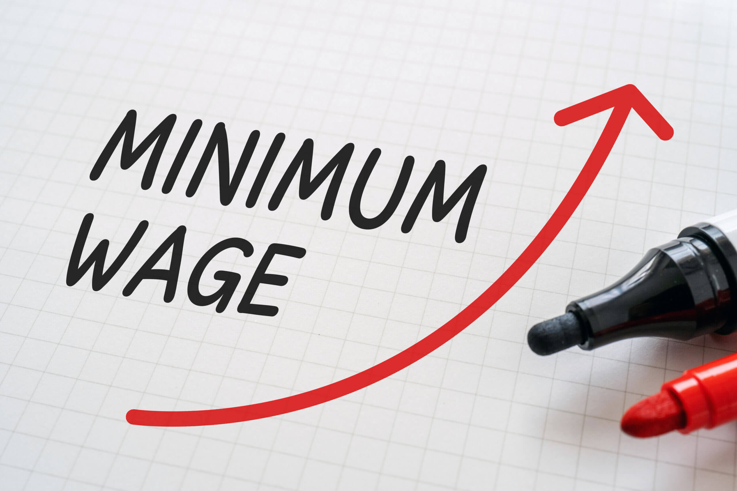 minimum wage with arrow pointing up