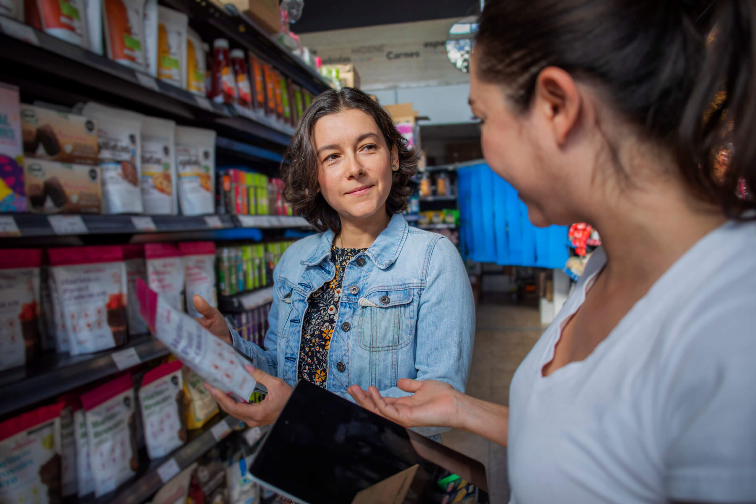 woman talking to retail worker