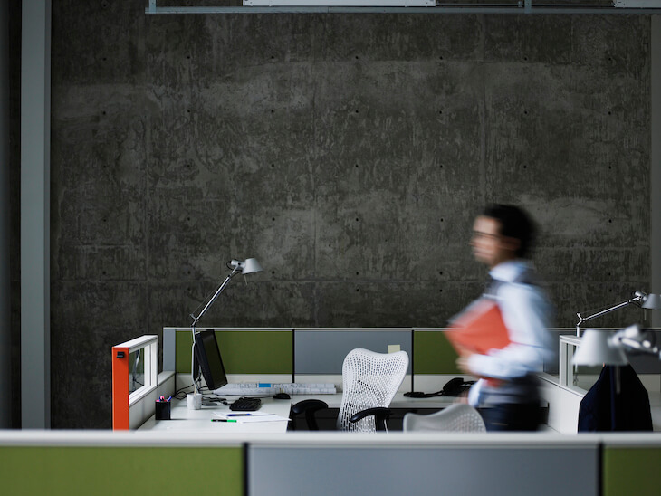 employee walks through empty office